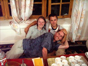 Kirby on fellow pilgrim's laps in Ladakh, India