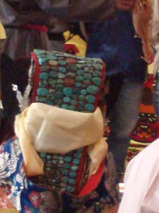 Bride at Ladakhi wedding, ceremonial headress of turquoise