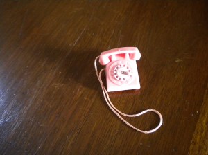 This phone is smaller than a book of matches!